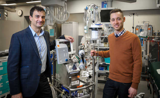 Dr. Daniel Kalla (left) and Dr. Brian Grunau with an ECPR machine. Brian Smith Photo